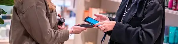Customer paying with a mobile POS terminal
